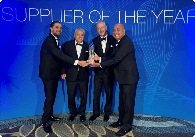 Management of Harper Engineering Co. receiving Supplier of the Year award at Boeing`s annual event.