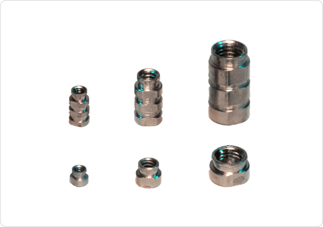 Molded-in locking inserts designed and manufactured by Harper Engineering Co.